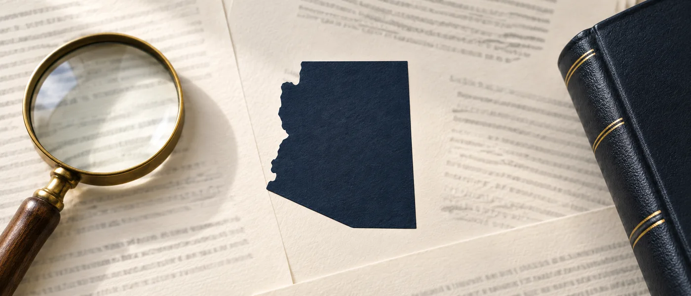 Editorial illustration of the Arizona state outline on legal documents beside a magnifying glass.